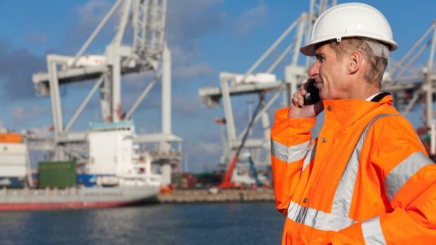 A person working at a port.